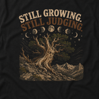 Still Growing, Still Judging Version Three T‑Shirt (Part of the Trees are Ancient Collection)
