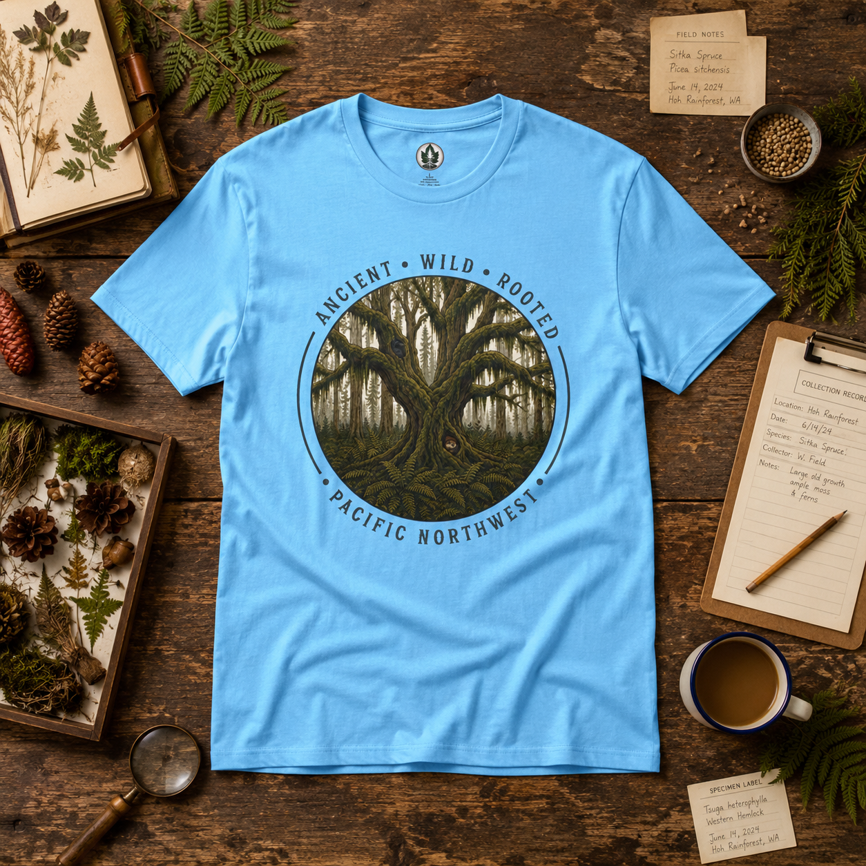 Pacific Northwest Tree T‑Shirt - "Ancient - Wild - Rooted" with Otto and Echo in the tree